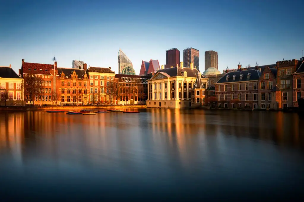 The Hague with the modern office buildings. Reflection of Hofvijver lake in Den Haag, Netherlands.